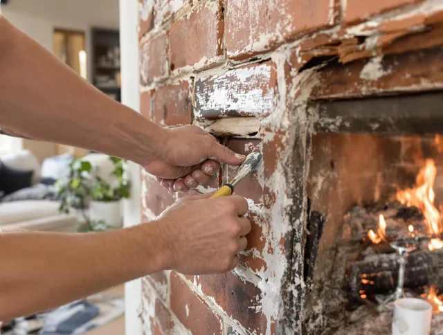 Routine fireplace repair by Fullerton Chimney Sweep in Fullerton, CA